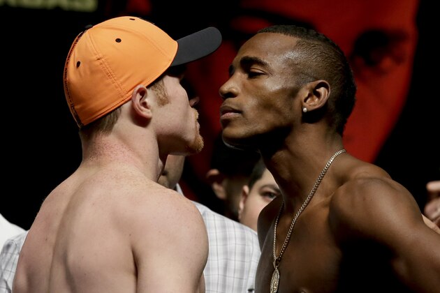 Canelo Alvarez, left, and Erislandy Lara pose for the media after the official weigh in for their Super Welterweight boxing match Friday, July 11, 2014 in Las Vegas. The pair will face off in the ring tomorrow at the MGM Grand arena. (AP Photo/Chris Carlson) Canelo Alvarez, left, and Erislandy Lara pose for the media after the official weigh in for their Super Welterweight boxing match Friday, July 11, 2014 in Las Vegas. The pair will face off in the ring tomorrow at the MGM Grand arena. (AP Photo/Chris Carlson)