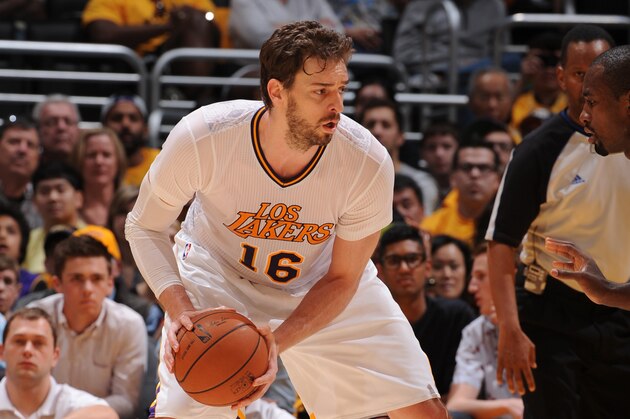 LOS ANGELES, CA - MARCH 9: Pau Gasol #16 of the Los Angeles Lakers handles the basketball during a game against the Oklahoma City Thunder at STAPLES Center on March 9, 2014 in Los Angeles, California. NOTE TO USER: User expressly acknowledges and agrees that, by downloading and/or using this Photograph, user is consenting to the terms and conditions of the Getty Images License Agreement. Mandatory Copyright Notice: Copyright 2014 NBAE (Photo by Andrew D. Bernstein/NBAE via Getty Images)