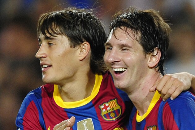 FC Barcelona's Lionel Messi from Argentina, right, reacts after scoring with fellow team member Bojan Krkic against Panathinaikos during a Group D Champions League first leg soccer match at the Camp Nou stadium in Barcelona, Spain, Tuesday, Sept. 14, 2010. (AP Photo/Manu Fernandez)