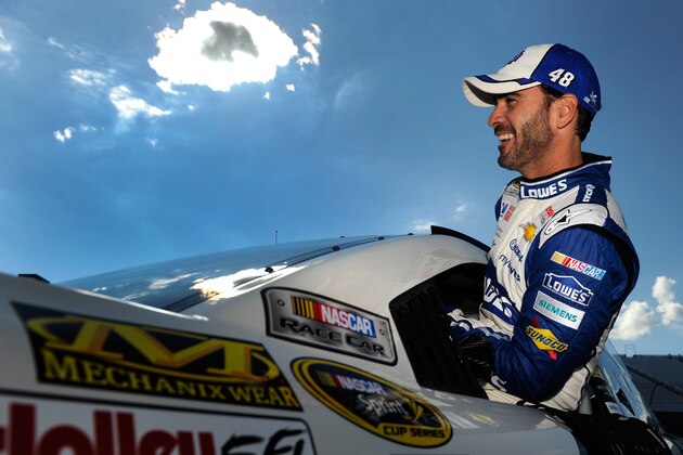LOUDON, NH - JULY 11:  Jimmie Johnson, driver of the #48 Lowe's Chevrolet, looks on during qualifying for the NASCAR Sprint Cup Series Camping World RV Sales 301 at New Hampshire Motor Speedway on July 11, 2014 in Loudon, New Hampshire.  (Photo by Jared C. Tilton/Getty Images)