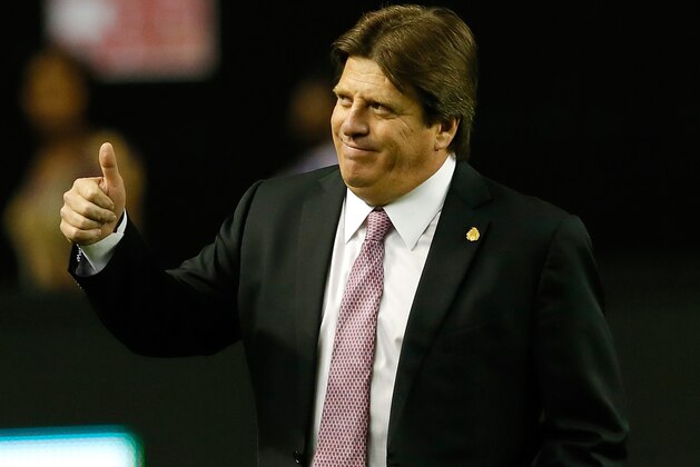 ATLANTA, GA - MARCH 05:  Head coach Miguel Herrera of Mexico walks onto the pitch prior to the match against Nigeria at Georgia Dome on March 5, 2014 in Atlanta, Georgia.  (Photo by Kevin C. Cox/Getty Images)