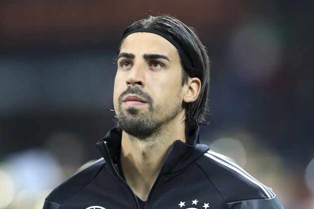 Germany midfielder Sami Khedira stands prior to the start of a friendly soccer match between Italy and Germany at the San Siro  stadium in Milan, Italy, Friday, Nov. 15, 2013. (AP Photo/Antonio Calanni)