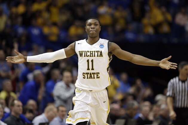 Wichita State's Cleanthony Early celebrates after hitting a shot during the second half of a third-round game against Kentucky of the NCAA college basketball tournament Sunday, March 23, 2014, in St. Louis. (AP Photo/Charlie Riedel)