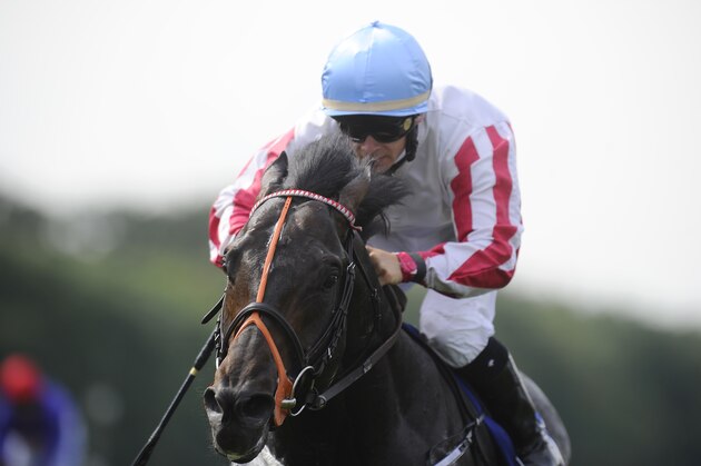 NEWMARKET, ENGLAND - JULY 12:  Wayne Lordan riding Slade Power win The Darley July Cup at Newmarket racecourse on July 12, 2014 in Newmarket, England. (Photo by Alan Crowhurst/Getty Images)