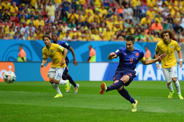 BRASILIA, BRAZIL - JULY 12: Robin van Persie of the Netherlands shoots and scores his team's first goal on a penalty kick during the 2014 FIFA World Cup Brazil Third Place Playoff match between Brazil and the Netherlands at Estadio Nacional on July 12, 2014 in Brasilia, Brazil.  (Photo by Jamie McDonald/Getty Images)