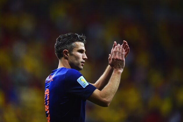 BRASILIA, BRAZIL - JULY 12: Robin van Persie of the Netherlands acknowledges the fans after defeating Brazil 3-0 during the 2014 FIFA World Cup Brazil Third Place Playoff match between Brazil and the Netherlands at Estadio Nacional on July 12, 2014 in Brasilia, Brazil.  (Photo by Jamie McDonald/Getty Images)
