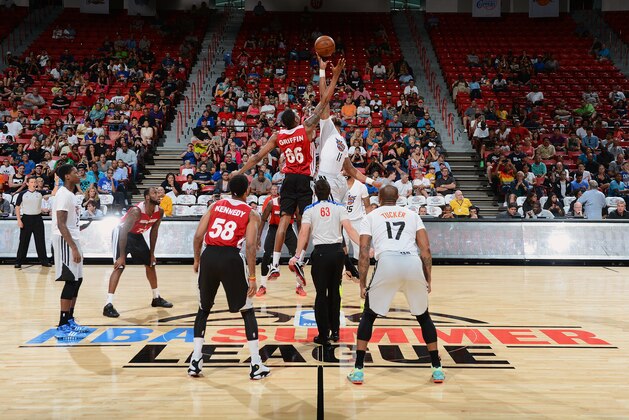 LAS VEGAS, NV - JULY 21:  Markieff Morris #11 of the Phoenix Suns battles for the ball control with Eric Griffin #66 of the Miami Heat during NBA Summer League game between the Phoenix Suns and the Miami Heat on July 21, 2013 at the Cox Pavilion in Las Vegas, Nevada. NOTE TO USER: User expressly acknowledges and agrees that, by downloading and/or using this Photograph, user is consenting to the terms and conditions of the Getty Images License Agreement. Mandatory Copyright Notice: Copyright 2013 NBAE (Photo by Garrett W. Ellwood/NBAE via Getty Images)