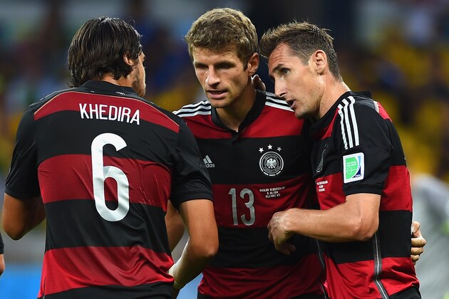 BELO HORIZONTE, BRAZIL - JULY 08: Miroslav Klose of Germany (R) celebrates scoring his team's second goal with teammates Sami Khedira (L) and Thomas Mueller during the 2014 FIFA World Cup Brazil Semi Final match between Brazil and Germany at Estadio Mineirao on July 8, 2014 in Belo Horizonte, Brazil. (Photo by Laurence Griffiths/Getty Images) BELO HORIZONTE, BRAZIL - JULY 08: Miroslav Klose of Germany (R) celebrates scoring his team's second goal with teammates Sami Khedira (L) and Thomas Mueller during the 2014 FIFA World Cup Brazil Semi Final match between Brazil and Germany at Estadio Mineirao on July 8, 2014 in Belo Horizonte, Brazil. (Photo by Laurence Griffiths/Getty Images)