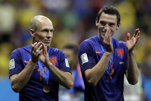 Netherlands' Arjen Robben, left and Stefan de Vrij applaud their supporters after their 3-0 victory over Brazil during the World Cup third-place soccer match between Brazil and the Netherlands at the Estadio Nacional in Brasilia, Brazil, Saturday, July 12, 2014. (AP Photo/Natacha Pisarenko) Netherlands' Arjen Robben, left and Stefan de Vrij applaud their supporters after their 3-0 victory over Brazil during the World Cup third-place soccer match between Brazil and the Netherlands at the Estadio Nacional in Brasilia, Brazil, Saturday, July 12, 2014. (AP Photo/Natacha Pisarenko)