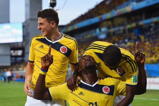 CUIABA, BRAZIL - JUNE 24:  Jackson Martinez of Colombia (center) celebrates scoring his team's second goal during the 2014 FIFA World Cup Brazil Group C match between Japan and Colombia at Arena Pantanal on June 24, 2014 in Cuiaba, Brazil.  (Photo by Christopher Lee/Getty Images)