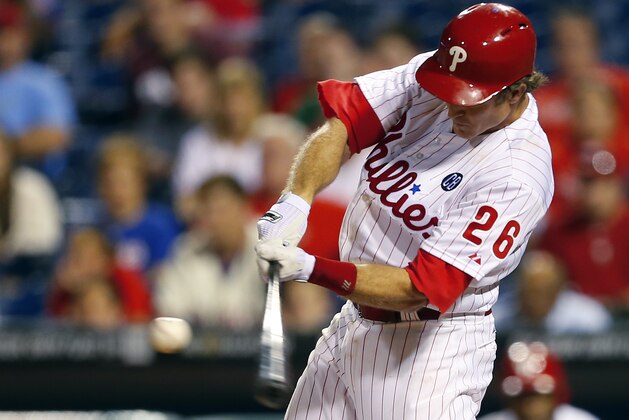 PHILADELPHIA, PA - JUNE 26:  Chase Utley #26 of the Philadelphia Phillies hits a two-run walk-off home run in the 14th inning to defeat the Miami Marlins 5-3. during the second inning in a game at Citizens Bank Park on June 26, 2014 in Philadelphia, Pennsylvania. (Photo by Rich Schultz/Getty Images)