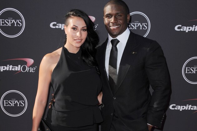 Detroit Lions' Reggie Bush, right, and Lilit Avagyan arrive at the ESPY Awards on Wednesday, July 17, 2013, at Nokia Theater in Los Angeles. (Photo by Jordan Strauss/Invision/AP)