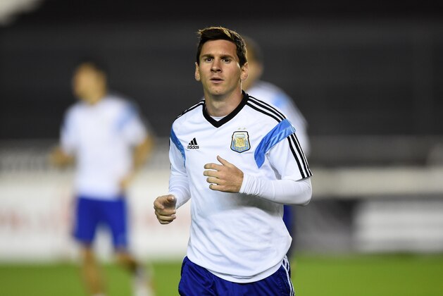 RIO DE JANEIRO, BRAZIL - JULY 12: Lionel Messi of Argentina warms up during the Argentina training session, ahead of the 2014 FIFA World Cup Final, at Estadio Sao Januario on July 12, 2014 in Rio de Janeiro, Brazil. (Photo by Matthias Hangst/Getty Images) RIO DE JANEIRO, BRAZIL - JULY 12: Lionel Messi of Argentina warms up during the Argentina training session, ahead of the 2014 FIFA World Cup Final, at Estadio Sao Januario on July 12, 2014 in Rio de Janeiro, Brazil. (Photo by Matthias Hangst/Getty Images)