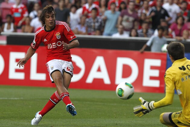 Benfica's Lazar Markovic, from Serbia, scores past Gil Vicente's goalkeeper Adriano Fachini, right, from Brazil, during their Portuguese league soccer match at Benfica's Luz stadium in Lisbon, Sunday, Aug. 25, 2013. Markovic scored once in Benfica's 2-1 win. (AP Photo/Francisco Seco) Benfica's Lazar Markovic, from Serbia, scores past Gil Vicente's goalkeeper Adriano Fachini, right, from Brazil, during their Portuguese league soccer match at Benfica's Luz stadium in Lisbon, Sunday, Aug. 25, 2013. Markovic scored once in Benfica's 2-1 win. (AP Photo/Francisco Seco)