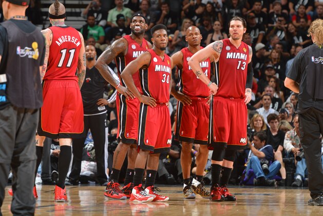SAN ANTONIO, TX - JUNE 11: LeBron James #6, Norris Cole #30, Ray Allen #34, and Mike Miller #13 of the Miami Heat looks on against the San Antonio Spurs during Game Three of the 2013 NBA Finals on June 11, 2013 at AT&T Center in San Antonio, Texas. NOTE TO USER: User expressly acknowledges and agrees that, by downloading and or using this photograph, User is consenting to the terms and conditions of the Getty Images License Agreement. Mandatory Copyright Notice: Copyright 2013 NBAE (Photo by Jesse D. Garrabrant/NBAE via Getty Images)