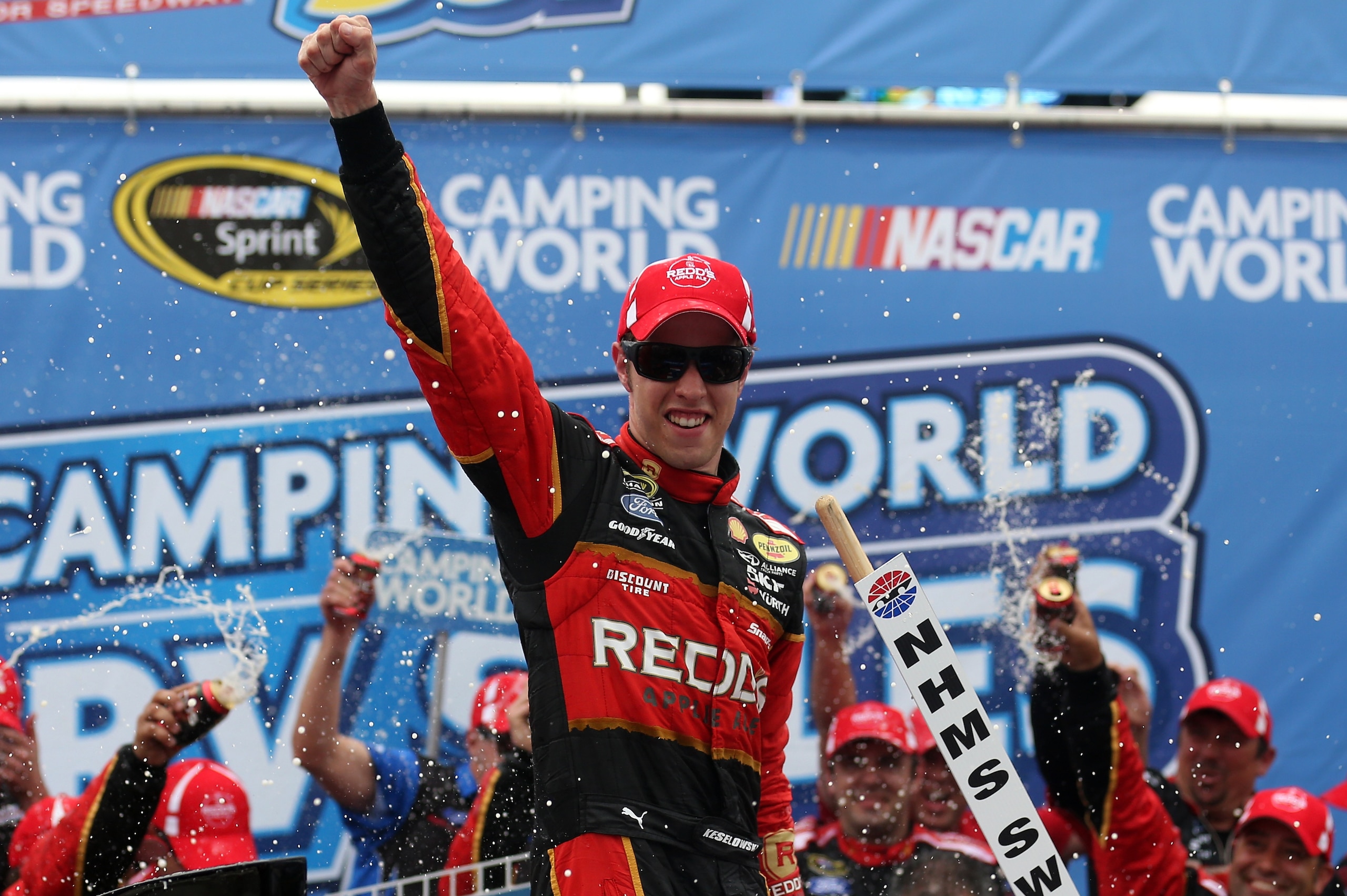 LOUDON, NH - JULY 13:  Brad Keselowski, driver of the #2 Redds Ford, celebrates in victory lane after winning the NASCAR Sprint Cup Series Camping World RV Sales 301 at New Hampshire Motor Speedway on July 13, 2014 in Loudon, New Hampshire.  (Photo by Nick Laham/Getty Images)