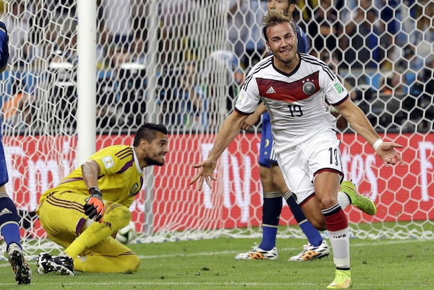 Germany's Mario Goetze celebrates after scoring the opening goal during the World Cup final soccer match between Germany and Argentina at the Maracana Stadium in Rio de Janeiro, Brazil, Sunday, July 13, 2014. Germany won 1-0 to win the World Cup. (AP Photo/Victor R. Caivano)