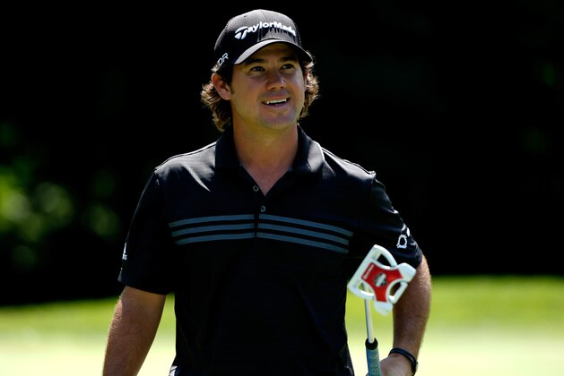SILVIS, IL - JULY 13:  Brian Harman walks off the 12th green during the final round of the John Deere Classic held at TPC Deere Run on July 13, 2014 in Silvis, Illinois.  (Photo by Gregory Shamus/Getty Images)
