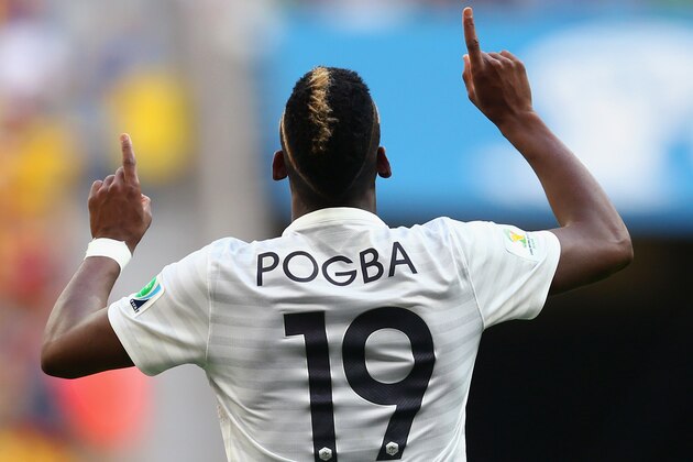 BRASILIA, BRAZIL - JUNE 30:  Paul Pogba of France celebrates scoring his team's first goal during the 2014 FIFA World Cup Brazil Round of 16 match between France and Nigeria at Estadio Nacional on June 30, 2014 in Brasilia, Brazil.  (Photo by Jeff Gross/Getty Images)