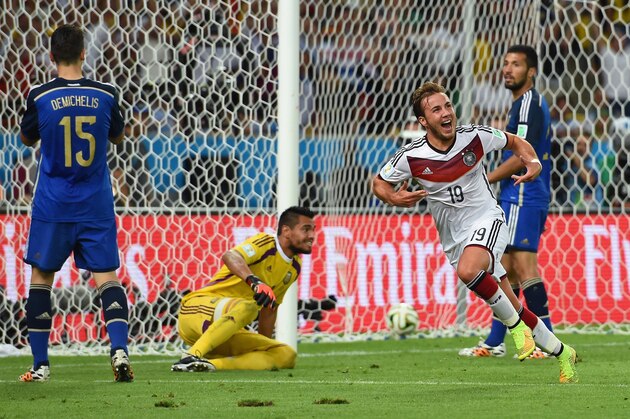 RIO DE JANEIRO, BRAZIL - JULY 13:  Mario Goetze of Germany celebrates scoring his team's first goal in extra time during the 2014 FIFA World Cup Brazil Final match between Germany and Argentina at Maracana on July 13, 2014 in Rio de Janeiro, Brazil.  (Photo by Matthias Hangst/Getty Images)