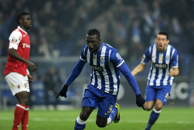 FC Porto's Jackson Martinez, from Colombia, center, celebrates with Hector Herrera from Mexico, rear, after scoring the opening goal against Sporting Braga in a Portuguese League soccer match at the Dragao Stadium in Porto, Portugal, Saturday, Dec. 7, 2013. (AP Photo/Paulo Duarte) FC Porto's Jackson Martinez, from Colombia, center, celebrates with Hector Herrera from Mexico, rear, after scoring the opening goal against Sporting Braga in a Portuguese League soccer match at the Dragao Stadium in Porto, Portugal, Saturday, Dec. 7, 2013. (AP Photo/Paulo Duarte)