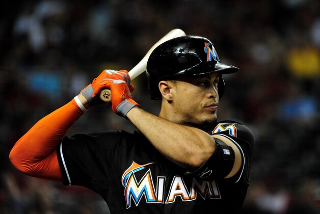 Jul 8, 2014; Phoenix, AZ, USA; Miami Marlins right fielder Giancarlo Stanton (27) looks on during the third inning against the Arizona Diamondbacks at Chase Field. Mandatory Credit: Matt Kartozian-USA TODAY Sports