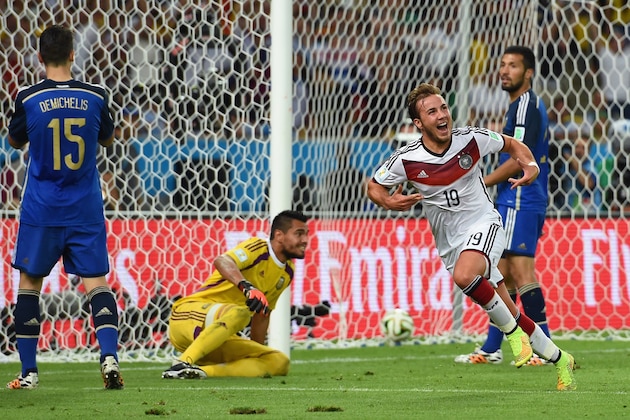 RIO DE JANEIRO, BRAZIL - JULY 13:  Mario Goetze of Germany celebrates scoring his team's first goal in extra time during the 2014 FIFA World Cup Brazil Final match between Germany and Argentina at Maracana on July 13, 2014 in Rio de Janeiro, Brazil.  (Photo by Matthias Hangst/Getty Images)