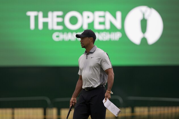 Tiger Woods of the US walks on the 2nd green during a practice round at the Royal Liverpool Golf Club prior to the start of the British Open Golf Championship, in Hoylake, England, Saturday, July 12, 2014. The 2014 Open Championship starts on Thursday, July 17. (AP Photo/Jon Super) Tiger Woods of the US walks on the 2nd green during a practice round at the Royal Liverpool Golf Club prior to the start of the British Open Golf Championship, in Hoylake, England, Saturday, July 12, 2014. The 2014 Open Championship starts on Thursday, July 17. (AP Photo/Jon Super)
