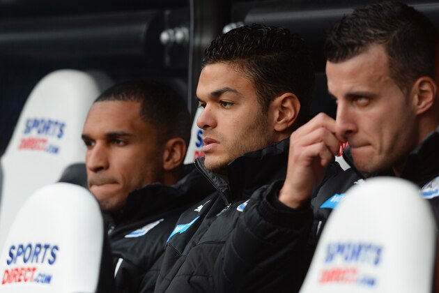 NEWCASTLE UPON TYNE, ENGLAND - MARCH 22:  Hatem Ben Arfa (C) of Newcastle United looks on from the bench during the Barclays Premier League match between Newcastle United and Crystal Palace at St James' Park on March 22, 2014 in Newcastle upon Tyne, England.  (Photo by Mark Runnacles/Getty Images)