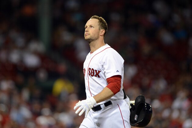 BOSTON, MA - JULY 7: Daniel Nava #29 of the Boston Red Sox walks back to the dugout after making an out against the Chicago White Sox in the ninth inning at Fenway Park on July 7, 2014 in Boston, Massachusetts. The White Sox won the game 4-0. (Photo by Darren McCollester/Getty Images)