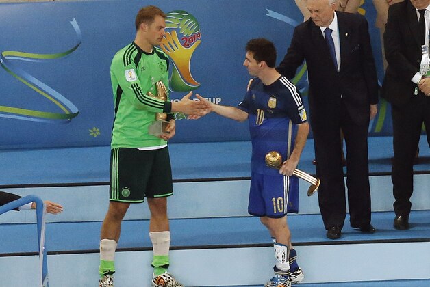 Germany's goalkeeper Manuel Neuer, left, greets Argentina's Lionel Messi after the World Cup final soccer match between Germany and Argentina at the Maracana Stadium in Rio de Janeiro, Brazil, Sunday, July 13, 2014. Mario Goetze volleyed in the winning goal in extra time to give Germany its fourth World Cup title with a 1-0 victory over Argentina on Sunday. (AP Photo/Fabrizio Bensch, Pool) Germany's goalkeeper Manuel Neuer, left, greets Argentina's Lionel Messi after the World Cup final soccer match between Germany and Argentina at the Maracana Stadium in Rio de Janeiro, Brazil, Sunday, July 13, 2014. Mario Goetze volleyed in the winning goal in extra time to give Germany its fourth World Cup title with a 1-0 victory over Argentina on Sunday. (AP Photo/Fabrizio Bensch, Pool)