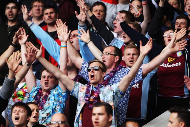 LONDON, ENGLAND - MAY 11:  Fans in fancy dress attend the Barclays Premier League match between Tottenham Hotspur and Aston Villa at White Hart Lane on May 11, 2014 in London, England.  (Photo by Clive Rose/Getty Images)