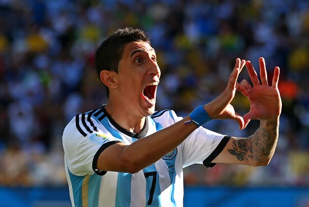 SAO PAULO, BRAZIL - JULY 01:  Angel di Maria of Argentina celebrates scoring his team's first goal in extra time during the 2014 FIFA World Cup Brazil Round of 16 match between Argentina and Switzerland at Arena de Sao Paulo on July 1, 2014 in Sao Paulo, Brazil.  (Photo by Julian Finney/Getty Images)