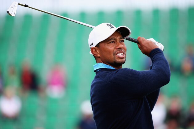 HOYLAKE, ENGLAND - JULY 13:  Tiger Woods of the USA tees off on the 4th hole during a practice round ahead of the 143rd Open Championship at Royal Liverpool on July 13, 2014 in Hoylake, England.  (Photo by Matthew Lewis/Getty Images)