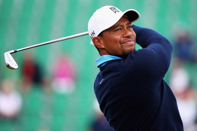 HOYLAKE, ENGLAND - JULY 13:  Tiger Woods of the USA tees off on the 4th hole during a practice round ahead of the 143rd Open Championship at Royal Liverpool on July 13, 2014 in Hoylake, England.  (Photo by Matthew Lewis/Getty Images)