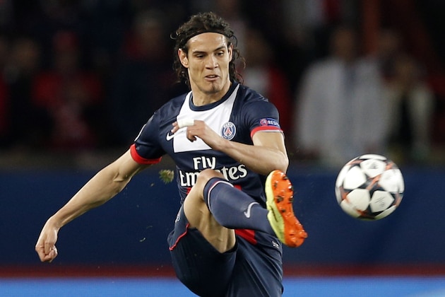 PSG's Edinson Cavani kicks during the Champions League quarterfinal first leg soccer match between PSG and Chelsea, at the Parc des Princes stadium, in Paris, Wednesday, April 2, 2014. (AP Photo/Christophe Ena)