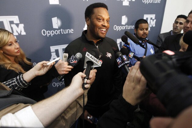 Texas A&M head football coach Kevin Sumlin talks to the media during Texas A&M's Pro Day, Wednesday, March 5, 2014, in College Station, Texas.  (AP Photo/Patric Schneider)