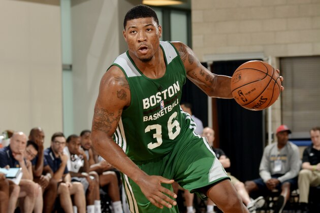 ORLANDO, FL - JULY 11: Marcus Smart #36 of the Boston Celtics drives against the Indiana Pacers on July 11, 2014 at Amway Center in Orlando, Florida. NOTE TO USER: User expressly acknowledges and agrees that, by downloading and or using this photograph, User is consenting to the terms and conditions of the Getty Images License Agreement. Mandatory Copyright Notice: Copyright 2014 NBAE  (Photo by Fernando Medina/NBAE via Getty Images)