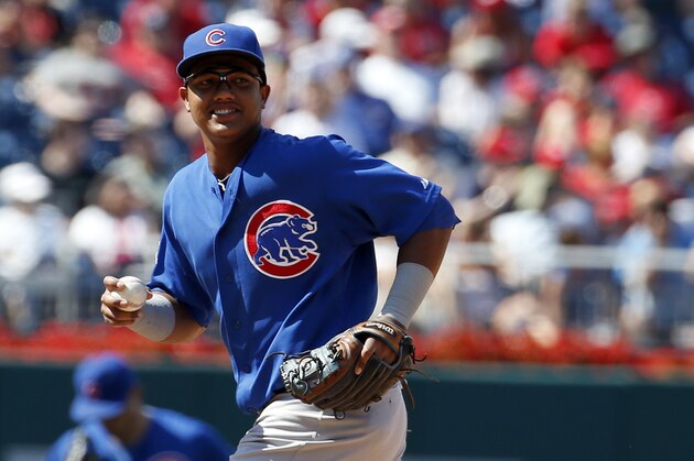 Chicago Cubs shortstop Starlin Castro (13) jogs off the field between innings during a baseball game against the Washington Nationals at Nationals Park, Sunday, July 6, 2014, in Washington. The Nationals won 2-1. (AP Photo/Alex Brandon)