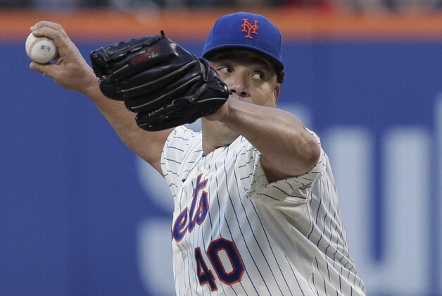 New York Mets pitcher Bartolo Colon works in the first inning against the Texas Rangers in a baseball game at Citi Field, Saturday, July 5, 2014 in New York. (AP Photo/Mark Lennihan)