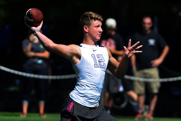 Jul 10, 2014; Beaverton, OR, USA; Apocalypse quarterback Blake Barnett (12) passes the ball during Nike Football ' The Opening' at Nike World Headquarters. Mandatory Credit: Steve Dykes-USA TODAY Sports Jul 10, 2014; Beaverton, OR, USA; Apocalypse quarterback Blake Barnett (12) passes the ball during Nike Football ' The Opening' at Nike World Headquarters. Mandatory Credit: Steve Dykes-USA TODAY Sports
