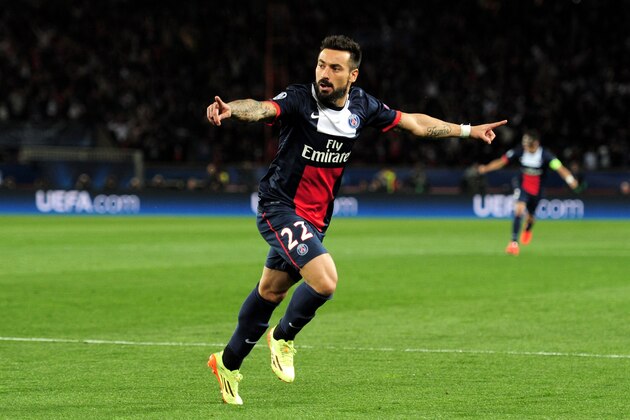 PARIS, FRANCE - APRIL 02:  Ezequiel Lavezzi of PSG celebrates after scoring the opening goal during the UEFA Champions League quarter final, first leg match between Paris Saint Germain and Chelsea at Parc des Princes on April 2, 2014 in Paris, France.  (Photo by Shaun Botterill/Getty Images)