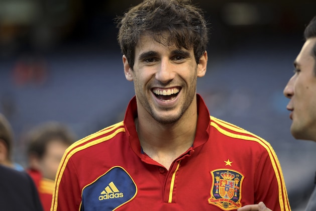 Spain midfielder Javi Martinez is seen on the field before the start of an exhibition international friendly soccer match against Ireland on Tuesday, June 11, 2013, at Yankee Stadium in New York. (AP Photo/Mary Altaffer)