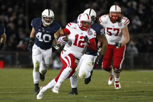 STATE COLLEGE, PA - NOVEMBER 23:  Ron Kellogg III #12 of the Nebraska Cornhuskers rushes against the Penn State Nittany Lions during the game on November 23, 2013 at Beaver Stadium in State College, Pennsylvania.  (Photo by Justin K. Aller/Getty Images)