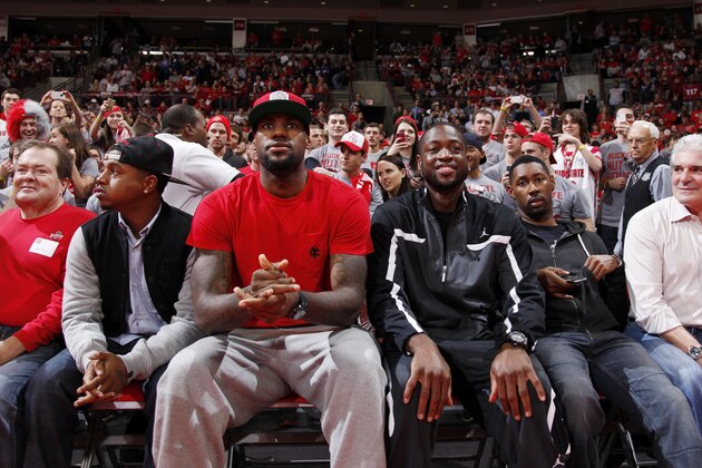 COLUMBUS, OH - NOVEMBER 29: LeBron James and Dwyane Wade of the NBA's Miami Heat look on from courtside seats during the game between the Ohio State Buckeyes and Duke Blue Devils at Value City Arena on November 29, 2011 in Columbus, Ohio. (Photo by Joe Robbins/Getty Images)