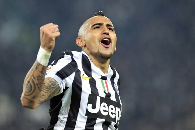 Juventus midfielder Arturo Vidal, of Chile, celebrates after scoring during a Serie A soccer match between Juventus and Inter Milan at the Juventus stadium, in Turin, Italy, Sunday, Feb. 2, 2014. (AP Photo/Massimo Pinca)