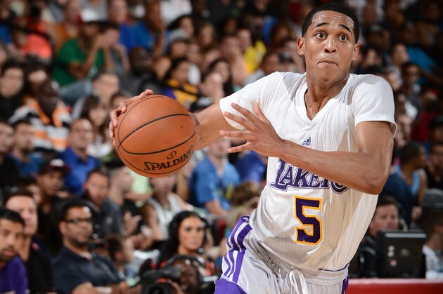 LAS VEGAS, NV - JULY 11: Jordan Clarkson #5 of the Los Angeles Lakers drives to the basket against the Toronto Raptors during the game on July 11, 2014 at the Cox Pavilion in Las Vegas, Nevada. NOTE TO USER: User expressly acknowledges and agrees that, by downloading and or using this photograph, User is consenting to the terms and conditions of the Getty Images License Agreement. Mandatory Copyright Notice: Copyright 2014 NBAE  (Photo by Garrett Ellwood/NBAE via Getty Images)