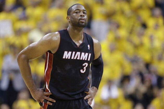 Miami Heat guard Dwyane Wade heads walks up the court during the second half of Game 5 against the Indiana Pacers in the NBA basketball Eastern Conference finals in Indianapolis, Wednesday, May 28, 2014. (AP Photo/Michael Conroy)