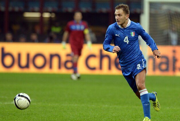 MILAN, ITALY - NOVEMBER 15:  Domenico Criscito of Italy in action during the international friendly match between Italy and Germany at Giuseppe Meazza stadium on November 15, 2013 in Milan, Italy.  (Photo by Claudio Villa/Getty Images)