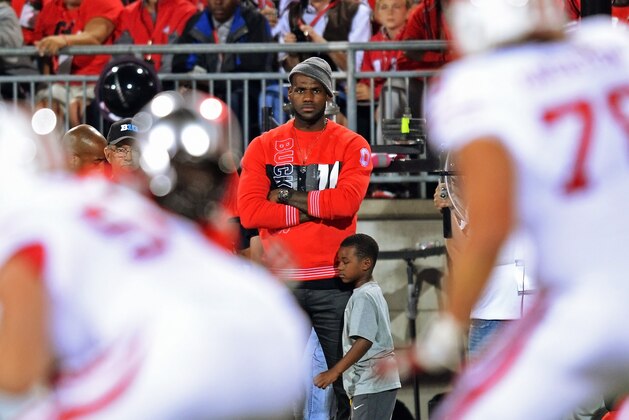 COLUMBUS, OH - SEPTEMBER 28: NBA player LeBron James watches from the sidelines as the Ohio State Buckeyes play the Wisconsin Badgers at Ohio Stadium on September 28, 2013 in Columbus, Ohio. (Photo by Jamie Sabau/Getty Images) COLUMBUS, OH - SEPTEMBER 28: NBA player LeBron James watches from the sidelines as the Ohio State Buckeyes play the Wisconsin Badgers at Ohio Stadium on September 28, 2013 in Columbus, Ohio. (Photo by Jamie Sabau/Getty Images)